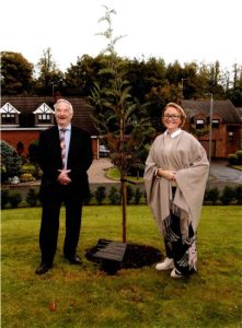 Local Chairman Ian Kyle and Peter Acheson's daughter Rosalind at the unveiling - Charles Sheils Charity